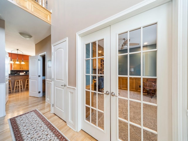 2705 147th St, Urbandale, IA 50323 - entryway featuring light wood-style floors and french doors