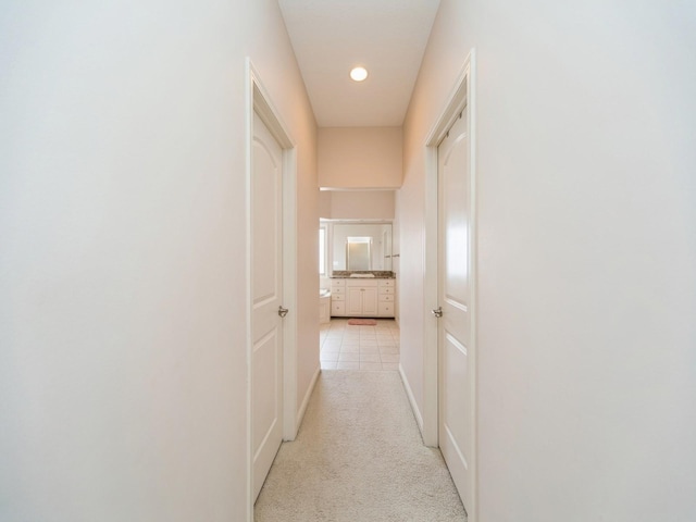 2705 147th St, Urbandale, IA 50323 - hallway with light colored carpet and baseboards