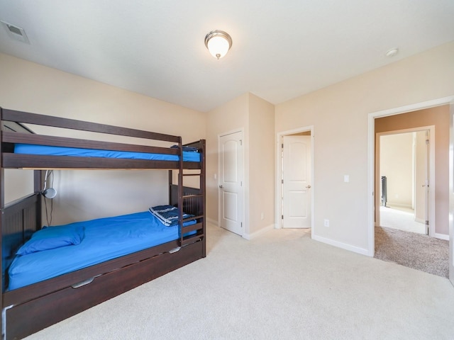2705 147th St, Urbandale, IA 50323 - carpeted bedroom featuring baseboards and visible vents