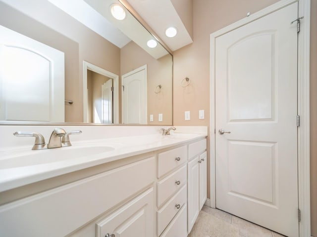 2705 147th St, Urbandale, IA 50323 - full bath featuring tile patterned floors, a sink, and double vanity