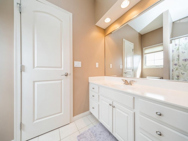 2705 147th St, Urbandale, IA 50323 - bathroom with baseboards, tile patterned floors, and vanity