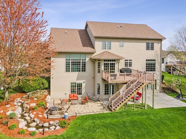 2705 147th St, Urbandale, IA 50323 - back of house with stairs, a deck, a yard, a patio, and an outdoor fire pit