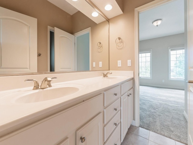 2705 147th St, Urbandale, IA 50323 - full bathroom with double vanity and tile patterned floors