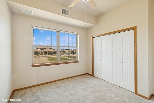 1370 SW Magazine Rd Unit 101, Ankeny, IA 50023 - unfurnished bedroom featuring baseboards, a closet, visible vents, and carpet