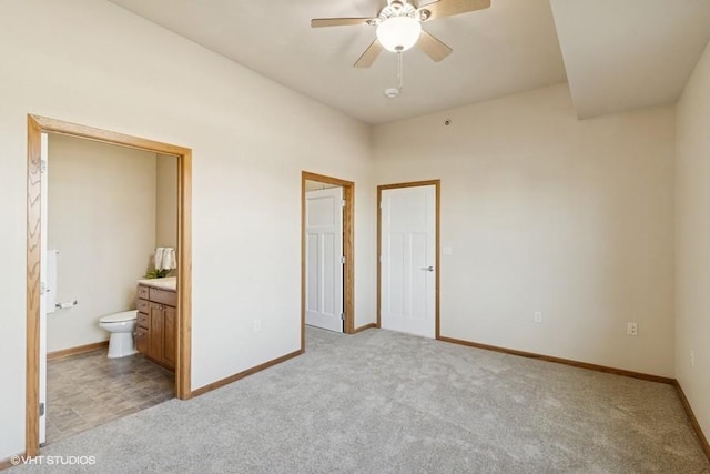 1370 SW Magazine Rd Unit 101, Ankeny, IA 50023 - unfurnished bedroom with baseboards, ensuite bath, and light colored carpet