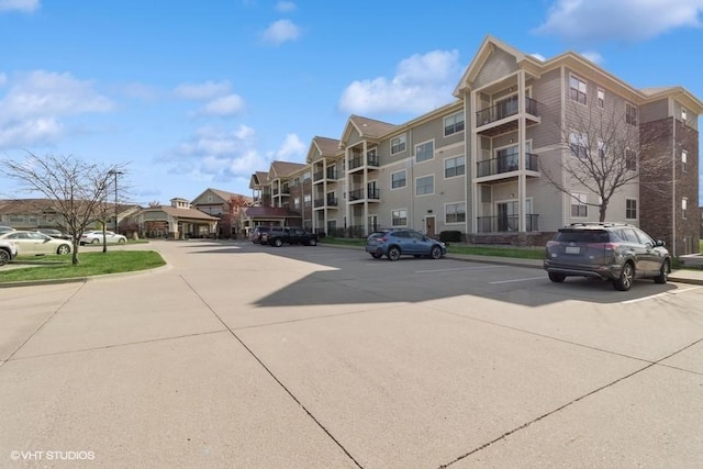 1370 SW Magazine Rd Unit 101, Ankeny, IA 50023 - view of property featuring uncovered parking