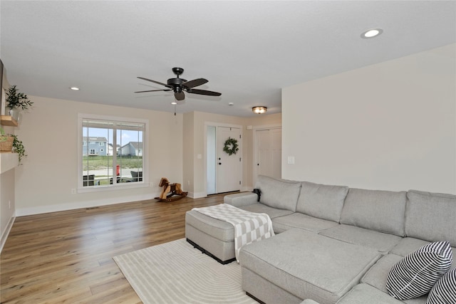 3121 NW 27th Cir, Ankeny, IA 50023 - living room with light wood-type flooring, baseboards, recessed lighting, and ceiling fan