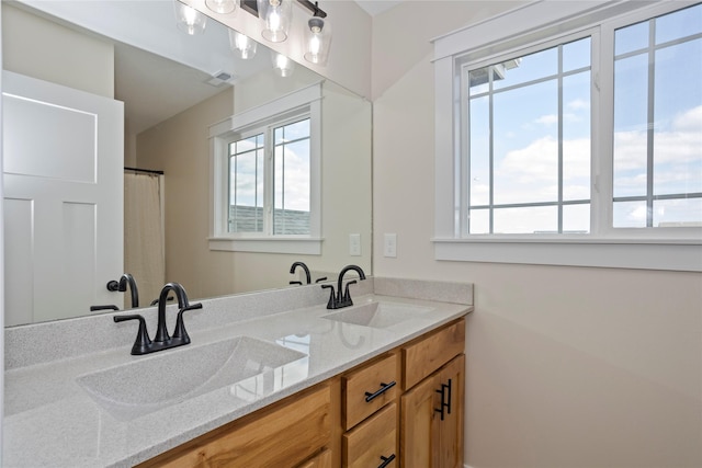 3121 NW 27th Cir, Ankeny, IA 50023 - full bath featuring healthy amount of natural light and double vanity