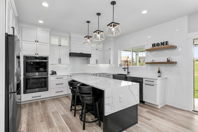 16318 Goldenrod Dr, Urbandale, IA 50323 - kitchen with white cabinetry, a sink, backsplash, and appliances with stainless steel finishes