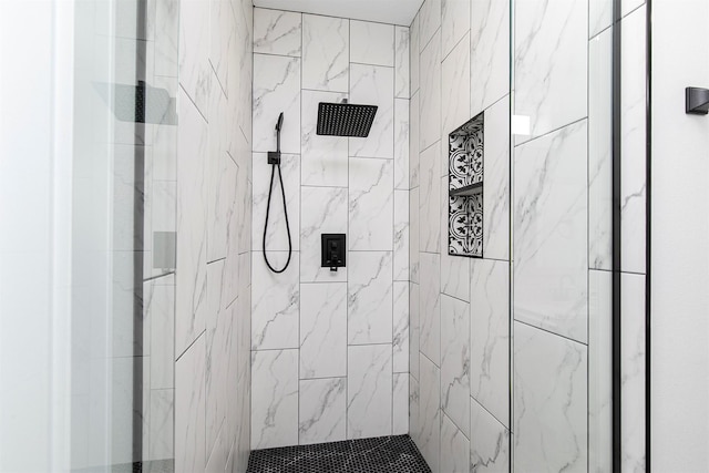 16318 Goldenrod Dr, Urbandale, IA 50323 - bathroom featuring a tile shower