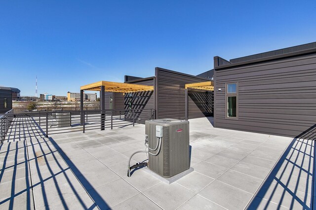 213 Maple St, Des Moines, IA 50309 - view of patio / terrace with cooling unit