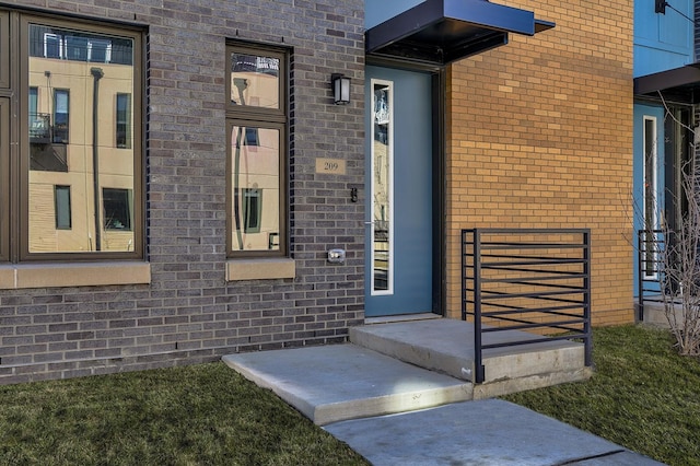 209 Maple St, Des Moines, IA 50309 - property entrance featuring brick siding