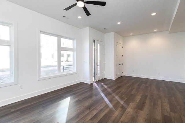 205 Maple St, Des Moines, IA 50309 - unfurnished room with visible vents, baseboards, ceiling fan, dark wood finished floors, and recessed lighting