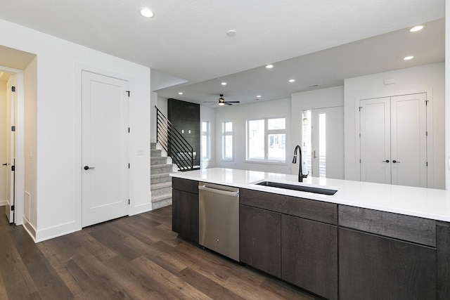 205 Maple St, Des Moines, IA 50309 - kitchen with dishwasher, a sink, light countertops, recessed lighting, and dark wood-type flooring