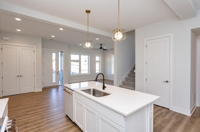 859 E 2nd St, Des Moines, IA 50309 - kitchen with light wood-type flooring, a ceiling fan, recessed lighting, a sink, and open floor plan