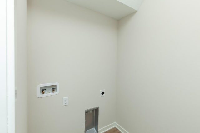 laundry area with baseboards, washer hookup, laundry area, hookup for an electric dryer, and wood finished floors