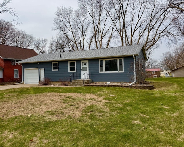 single story home with roof with shingles, a garage, a front yard, and concrete driveway