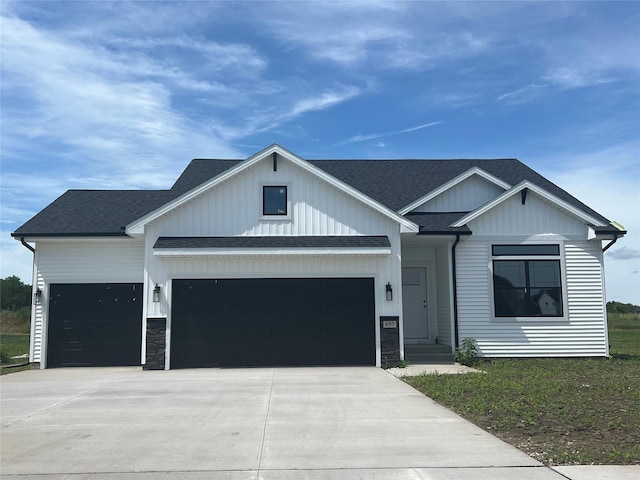 657 SE Hollow Ct, West Des Moines, IA 50265 - modern farmhouse featuring a garage, roof with shingles, concrete driveway, and board and batten siding