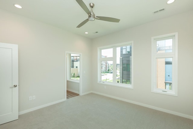 822 E 2nd St, Des Moines, IA 50309 - unfurnished bedroom featuring recessed lighting, visible vents, baseboards, and carpet floors