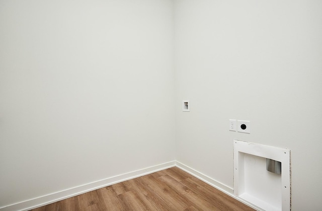 laundry room with laundry area, light wood-style floors, hookup for a washing machine, baseboards, and electric dryer hookup