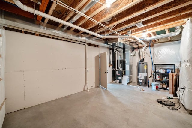 2102 NW 24th St, Ankeny, IA 50023 - unfinished basement with water heater and heating unit
