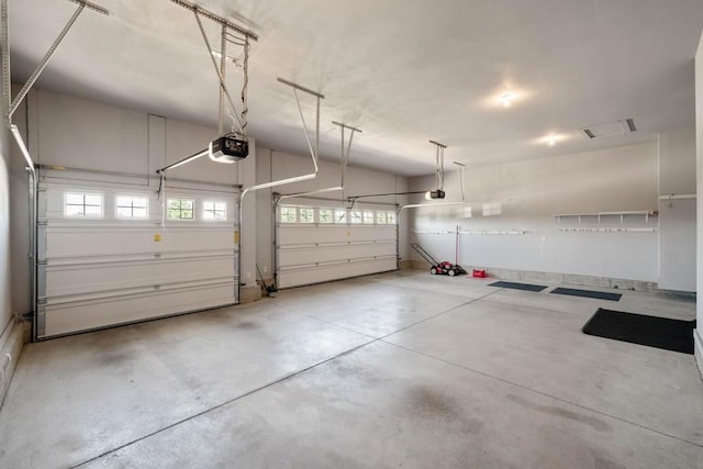 2102 NW 24th St, Ankeny, IA 50023 - garage featuring a garage door opener