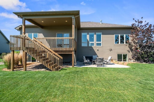 2102 NW 24th St, Ankeny, IA 50023 - back of house with a patio area, stairs, a wooden deck, and a yard