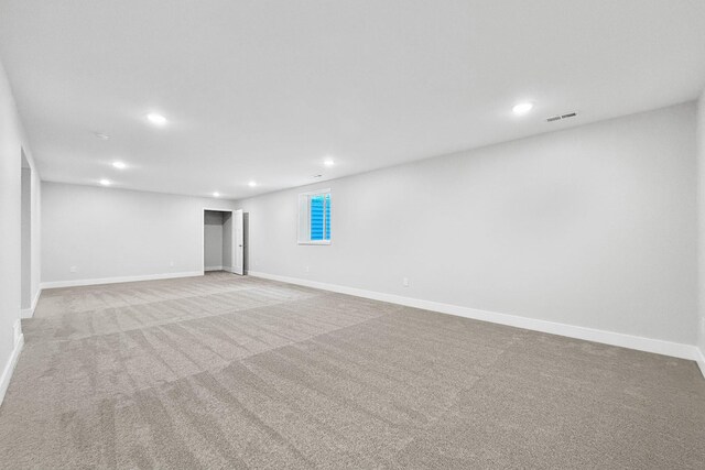 324 Veterans Blvd, Knoxville, IA 50138 - below grade area featuring recessed lighting and carpet