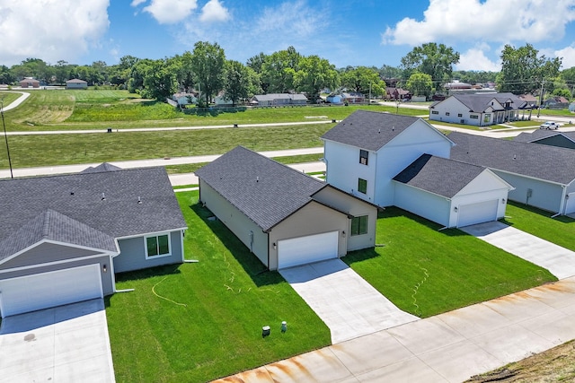 324 Veterans Blvd, Knoxville, IA 50138 - aerial perspective of suburban area with a tree filled landscape