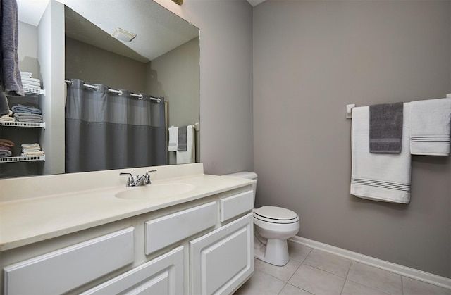 1325 SE Florence Dr Unit 211, Waukee, IA 50263 - full bath with baseboards, curtained shower, toilet, vanity, and tile patterned flooring