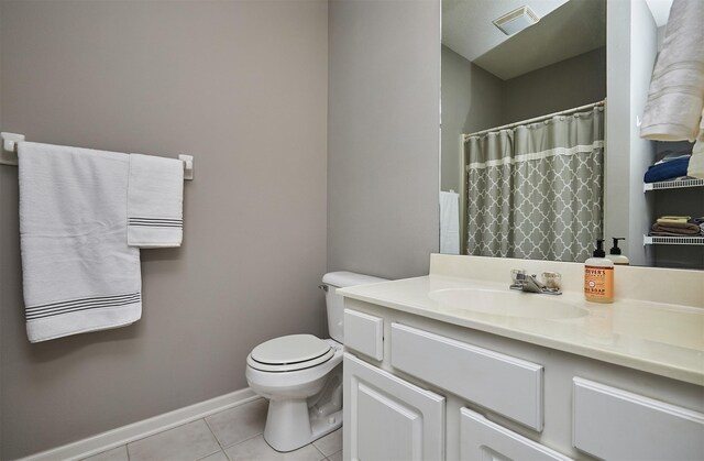 1325 SE Florence Dr Unit 211, Waukee, IA 50263 - full bathroom with vanity, baseboards, tile patterned floors, toilet, and visible vents