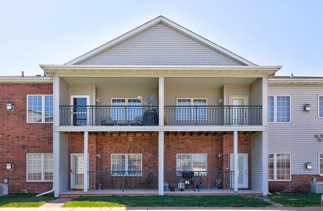 1325 SE Florence Dr Unit 211, Waukee, IA 50263 - view of front of house with central AC unit