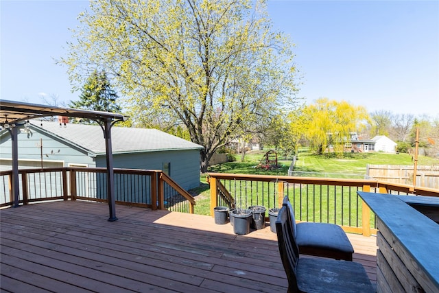 deck featuring a yard