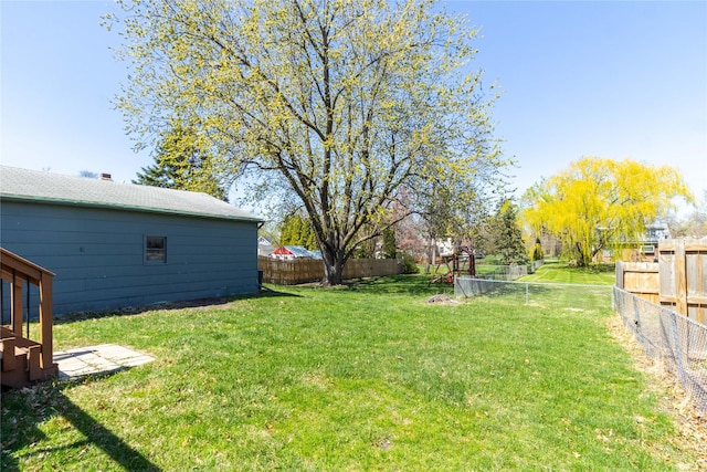 view of yard featuring a fenced backyard