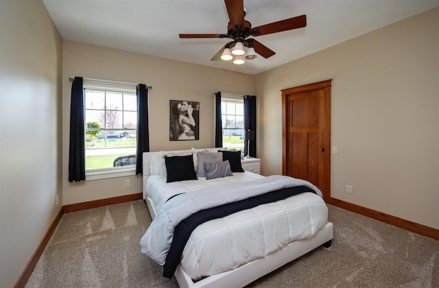 5570 Sunburst Dr, Pleasant Hill, IA 50327 - bedroom featuring ceiling fan, carpet flooring, and baseboards
