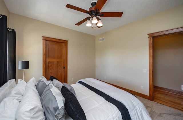 5570 Sunburst Dr, Pleasant Hill, IA 50327 - carpeted bedroom featuring ceiling fan, baseboards, and visible vents