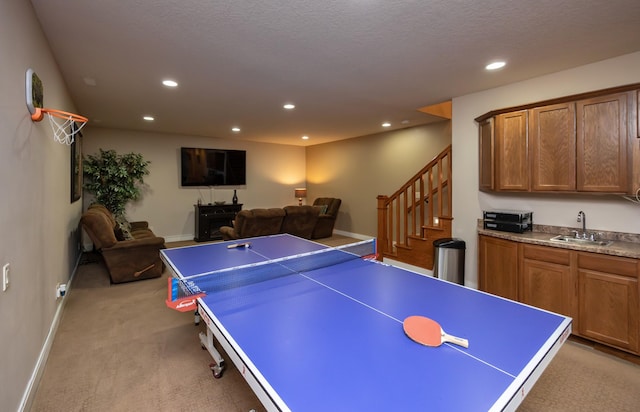 5570 Sunburst Dr, Pleasant Hill, IA 50327 - playroom with indoor wet bar, recessed lighting, light carpet, a sink, and baseboards