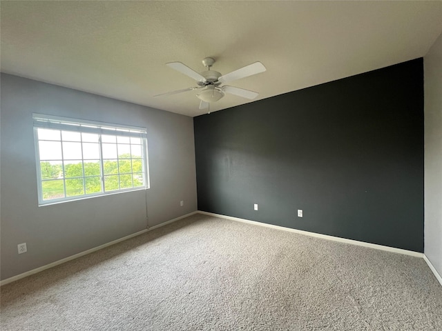 6440 Ep True Pkwy Unit 2307, West Des Moines, IA 50266 - carpeted spare room featuring ceiling fan and baseboards