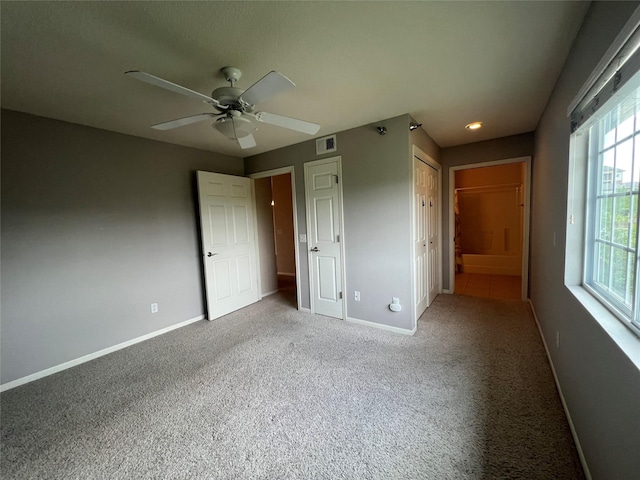 6440 Ep True Pkwy Unit 2307, West Des Moines, IA 50266 - unfurnished bedroom with carpet floors and a ceiling fan