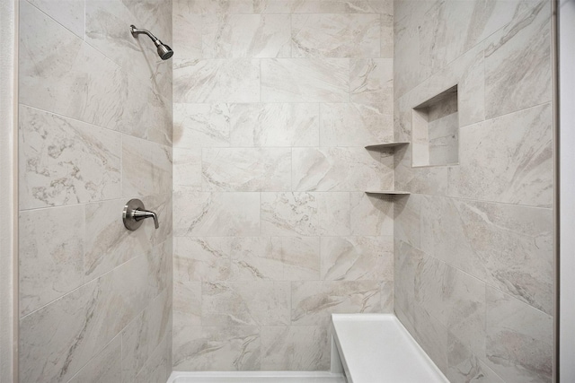 1609 Garland Ave, Norwalk, IA 50021 - bathroom featuring a tile shower