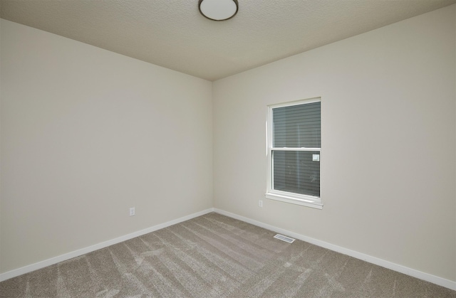 1139 NW Petersen Dr, Waukee, IA 50263 - empty room with carpet flooring and baseboards