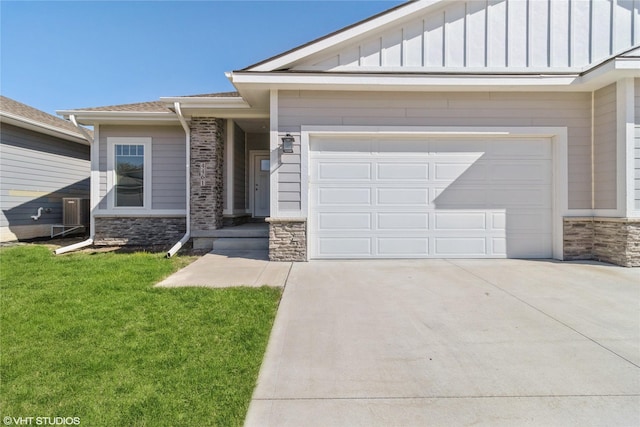 view of front facade featuring concrete driveway, stone siding, board and batten siding, an attached garage, and a front yard