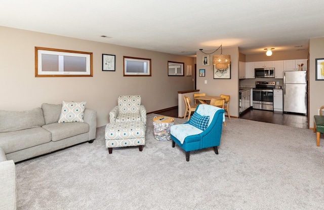5322 Ingersoll Ave Unit B5, Des Moines, IA 50312 - living room with dark colored carpet