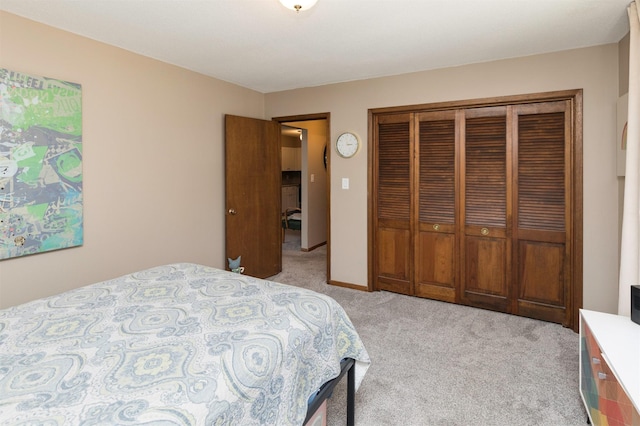 5322 Ingersoll Ave Unit B5, Des Moines, IA 50312 - bedroom with light colored carpet and a closet