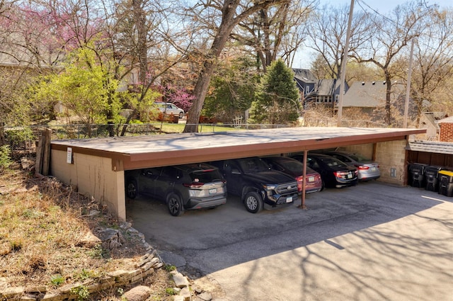 5322 Ingersoll Ave Unit B5, Des Moines, IA 50312 - view of car parking with a carport