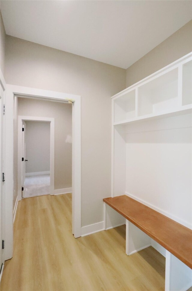 304 13th St NW, Bondurant, IA 50035 - mudroom with light wood-type flooring and baseboards