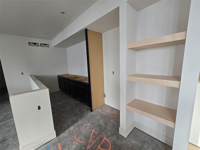 4611 Centennial Blvd, Urbandale, IA 50323 - bar area featuring concrete flooring