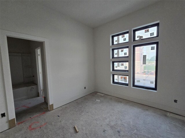 4611 Centennial Blvd, Urbandale, IA 50323 - unfurnished bedroom featuring baseboards