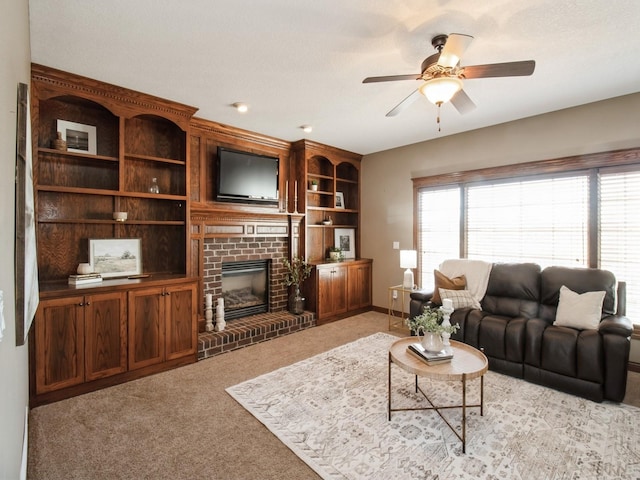 1835 SE Hillside Dr, Ankeny, IA 50021 - living room featuring a brick fireplace, ceiling fan, and carpet