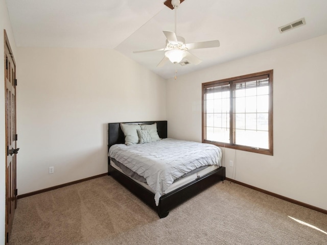 1835 SE Hillside Dr, Ankeny, IA 50021 - bedroom featuring light carpet, lofted ceiling, and ceiling fan